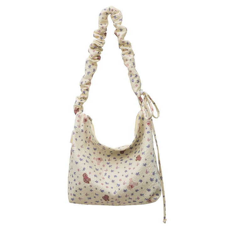 Playful Character-Themed Hobo Bag Bowlift