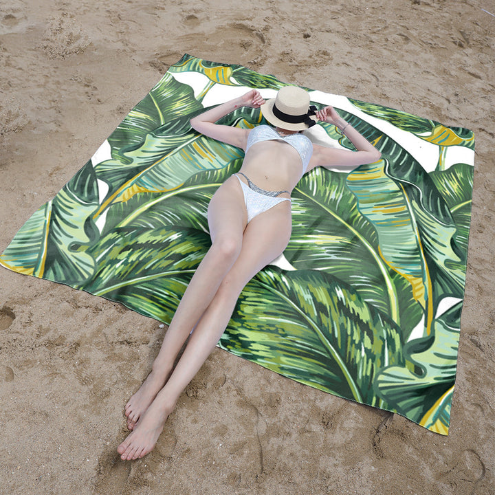 Beach blanket with vibrant floral pattern and innovative structure Bowlift