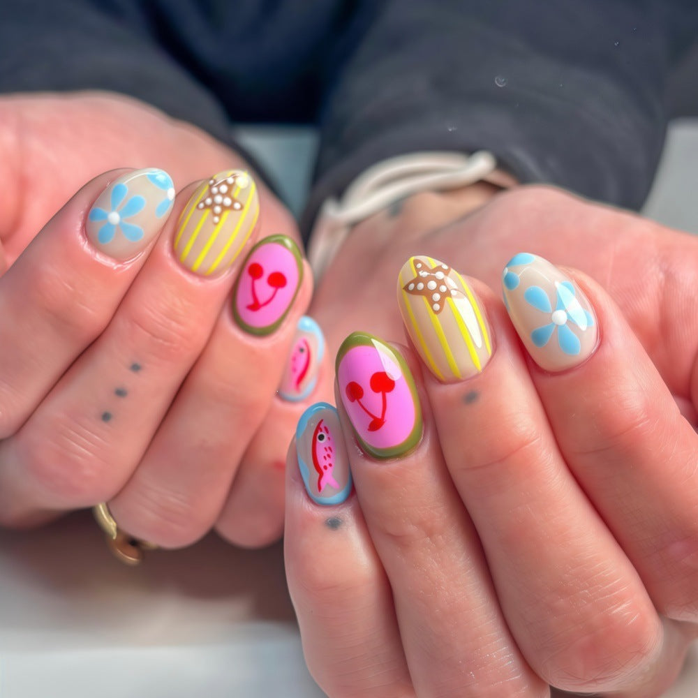 Artificial nails with playful fruit and flower motif Bowlift