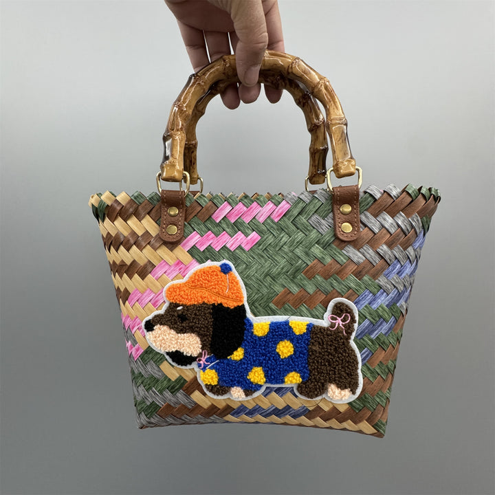 Playful Bast Handbag Bowlift