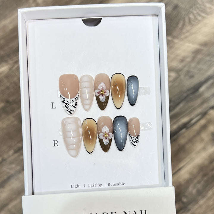 Artistic Stiletto Press-On Nail Set with Floral Accent Bowlift