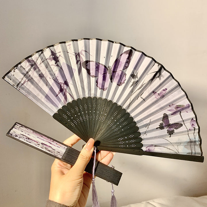 Elegant fan with elaborate butterfly motif Bowlift