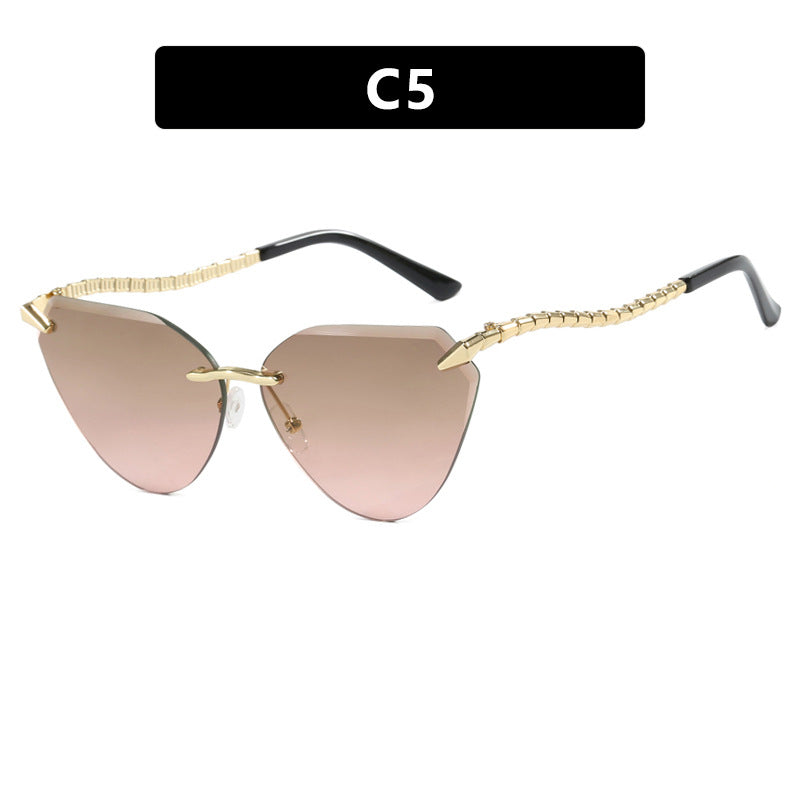 Women's Cat-Eye Sunglasses with unique gold frame design and protective lenses Bowlift