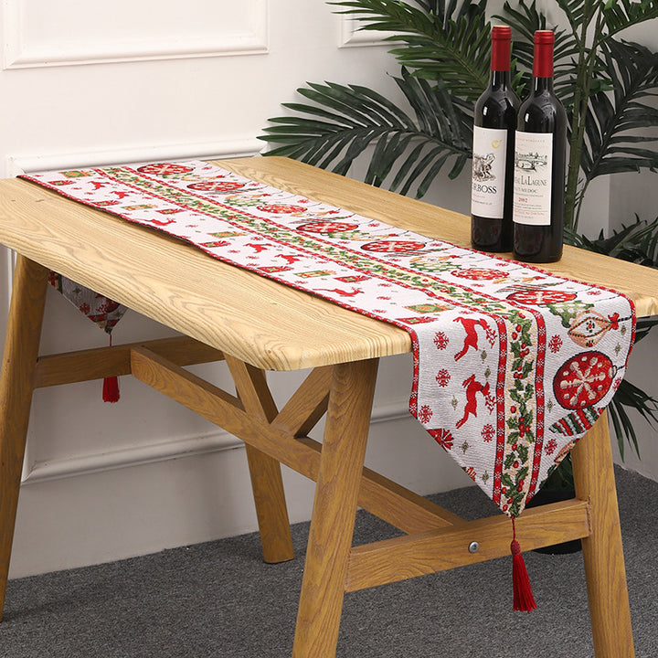 Festive table runner with reindeer motif Bowlift