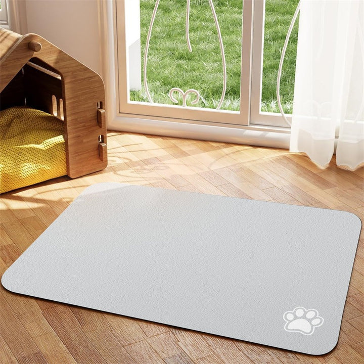 Non-Slip Waterproof Silicone Pet Feeding Mat with Raised Rim and Paw-Print Grip Bowlift