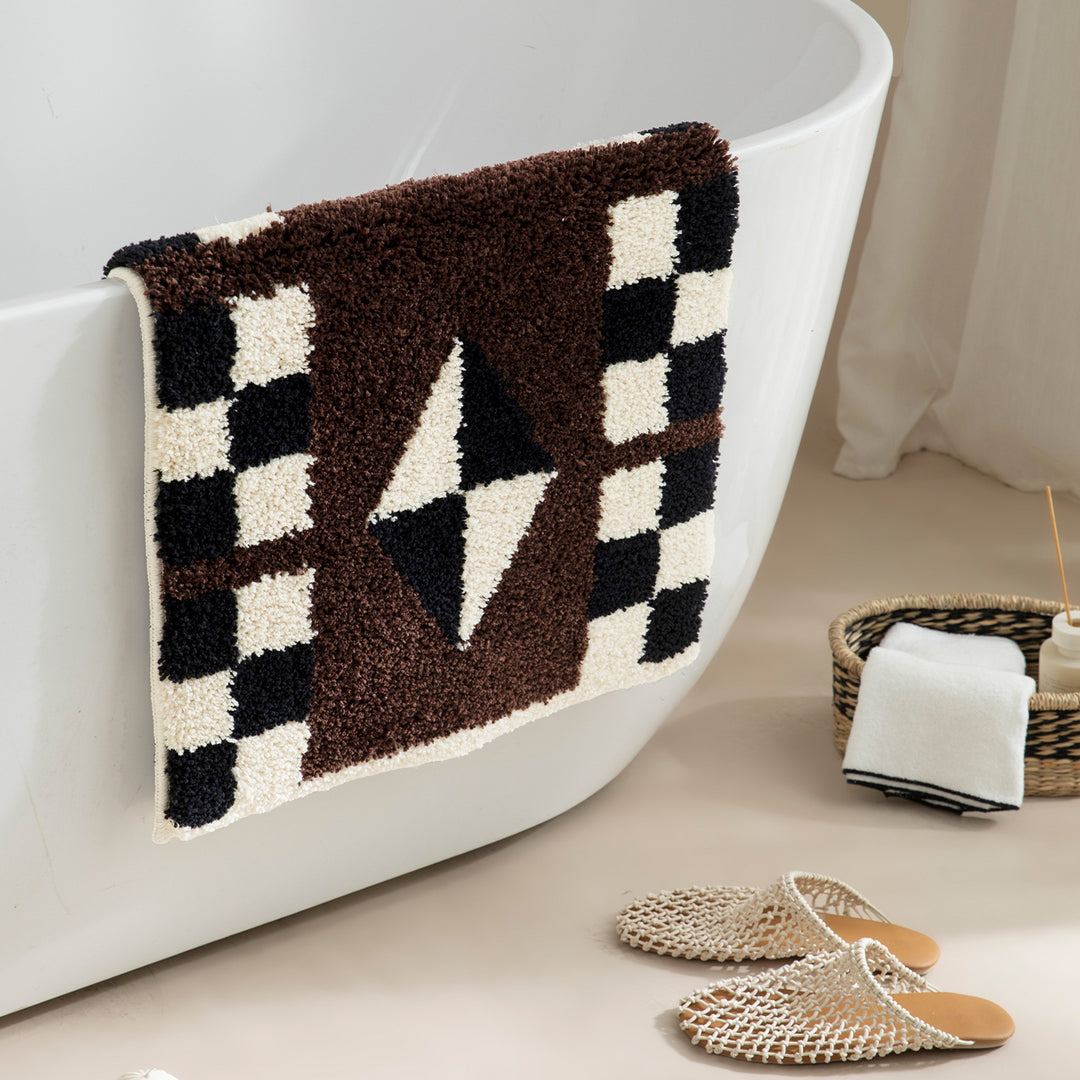 Tufted, soft bath mat with geometric ethnic pattern and non-slip underside Bowlift