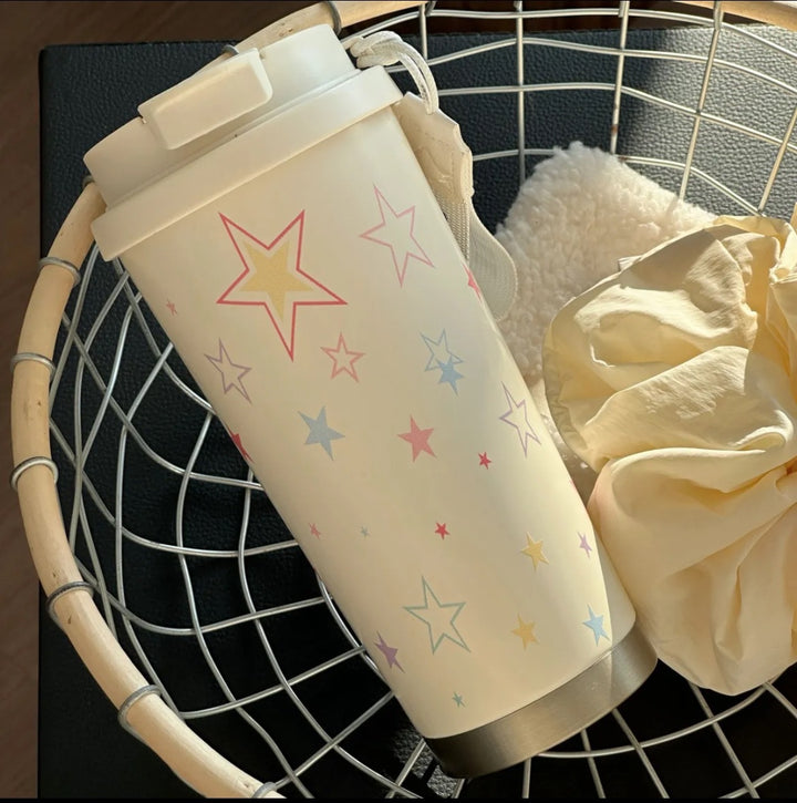 Women's insulated mug with practical carrying handle and charming Hello Kitty design Bowlift