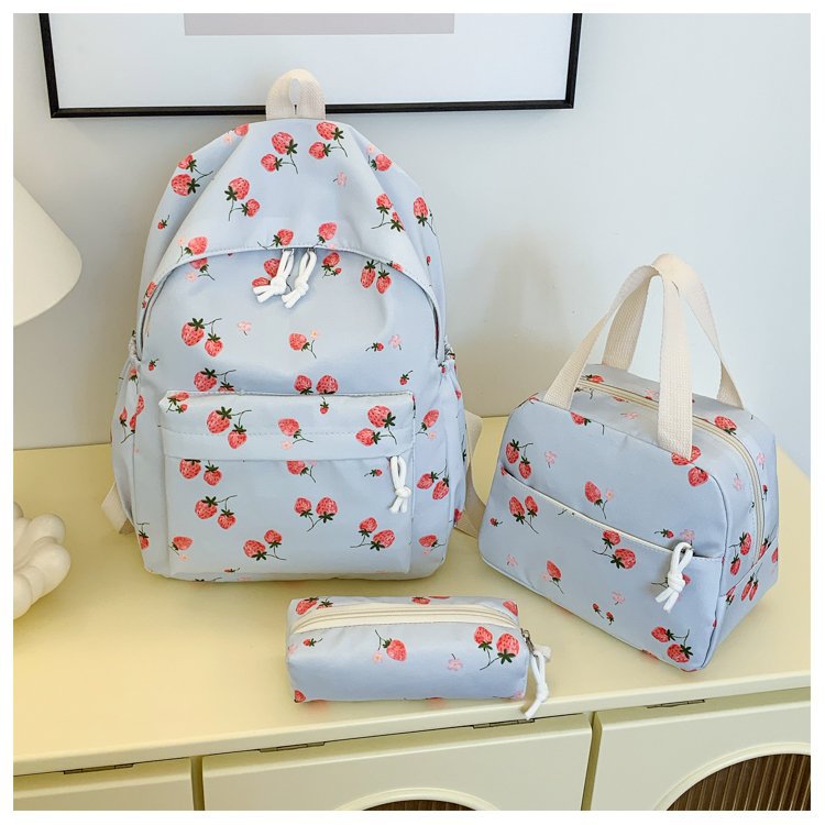 Backpack set with cheerful strawberry pattern and practical compartments Bowlift