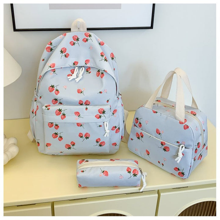 Backpack set with cheerful strawberry pattern and practical compartments Bowlift