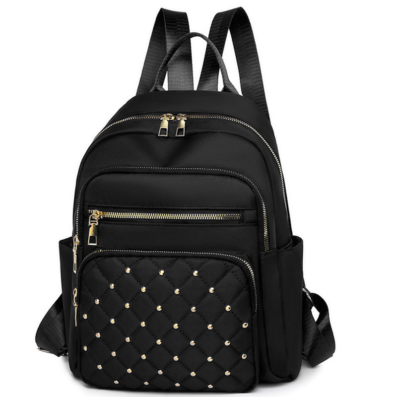 Women's Quilted Backpack with Decorative Studs Bowlift