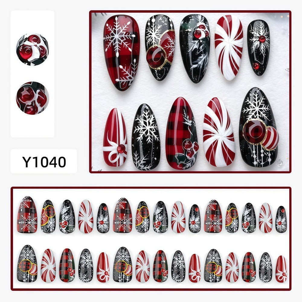 Artificial nails in festive Christmas design Bowlift