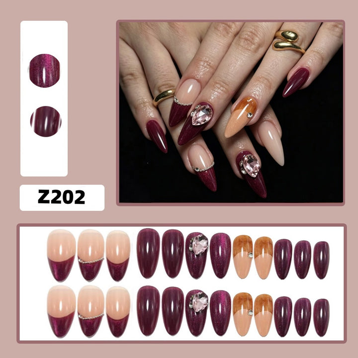 Artificial nails in elegant French design with glitter accents Bowlift