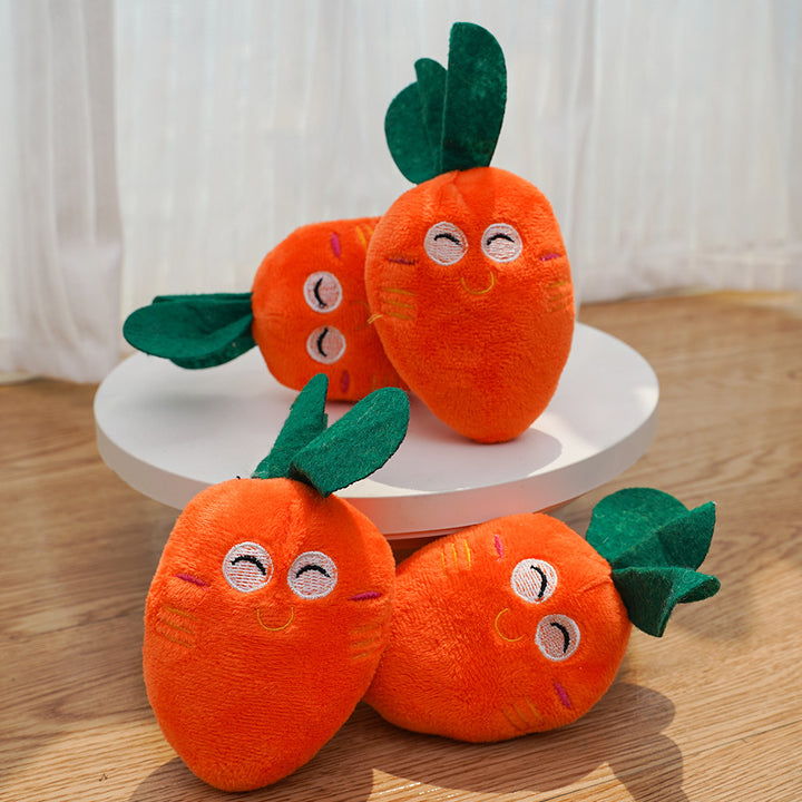 Plush carrot catnip toy for cats with embroidered smiling face and double leaf topper Bowlift