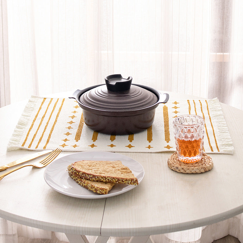 Woven placemat made of cotton blend with geometric diamond trim and fine texture Bowlift