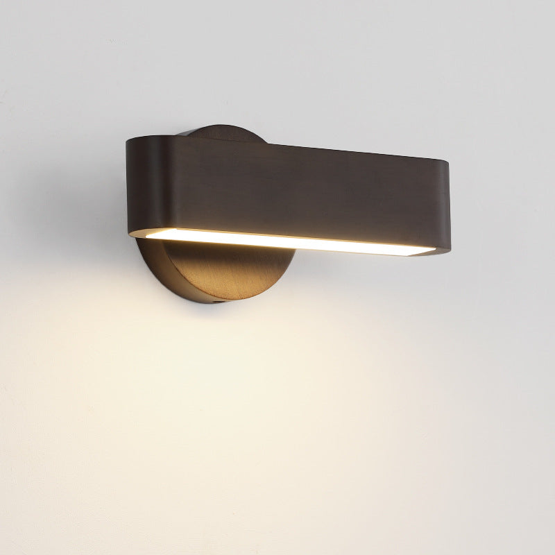 Compact bedside solid wood LED wall sconce with curved aluminum shade and frosted diffuser Bowlift