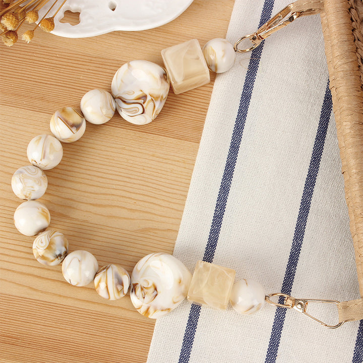 Braided Clutch with Pearl Accent Bowlift