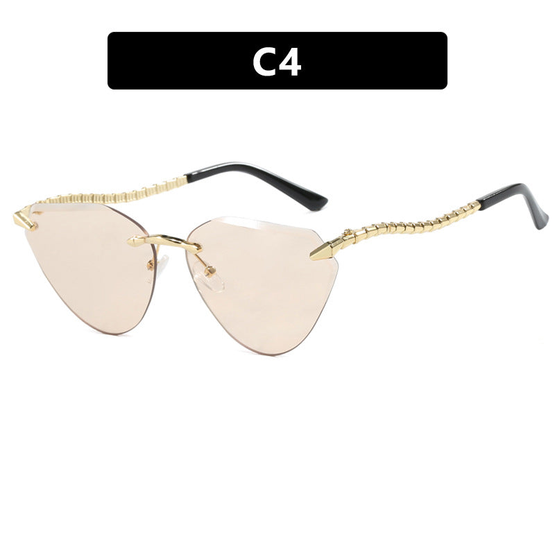 Women's Cat-Eye Sunglasses with unique gold frame design and protective lenses Bowlift