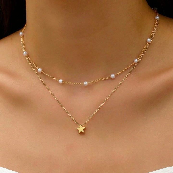 Layered Pearl and Star Charm Necklace Bowlift