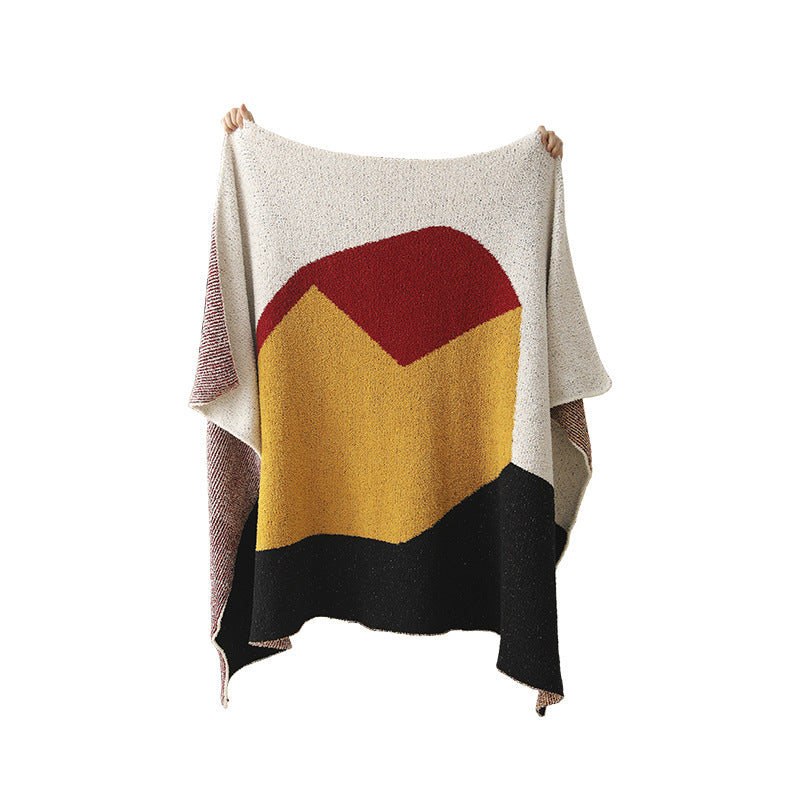 Coarsely woven decorative blanket with geometric jacquard pattern and soft bouclé Bowlift