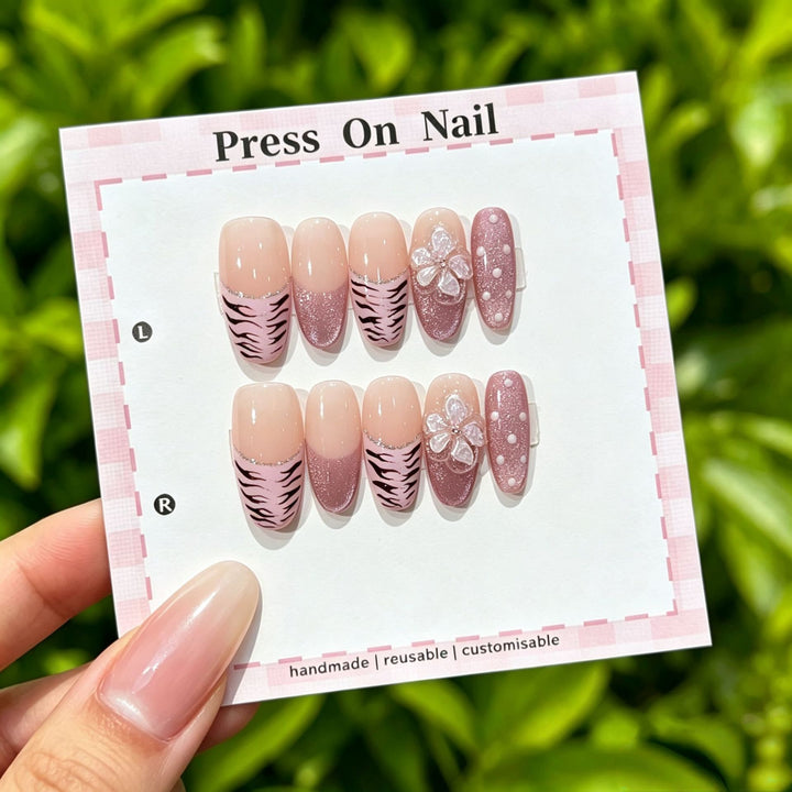 Artistic Press-On Nail Set with Floral and Graphic Designs