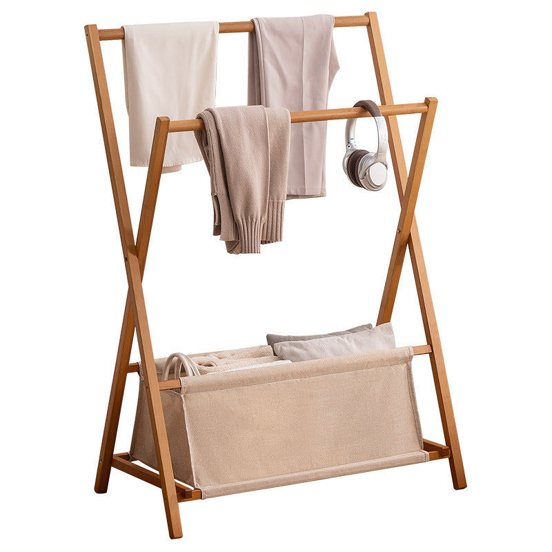 Designer laundry rack with foldable frame and practical shelf Bowlift