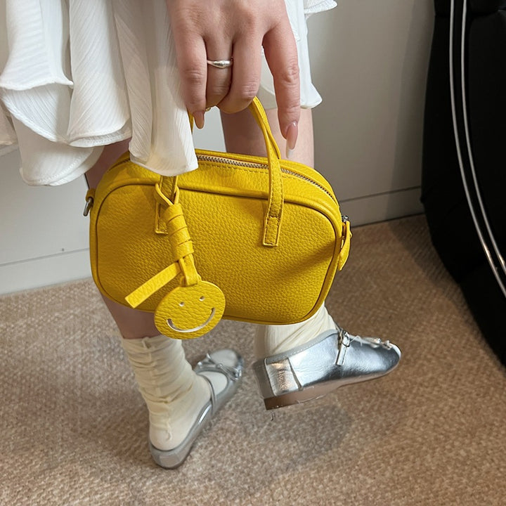 Compact Textured Mini Handbag Bowlift