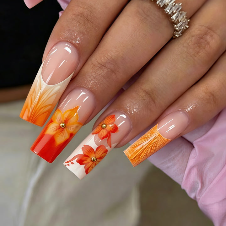 Nail art with floral accents and glitter Bowlift