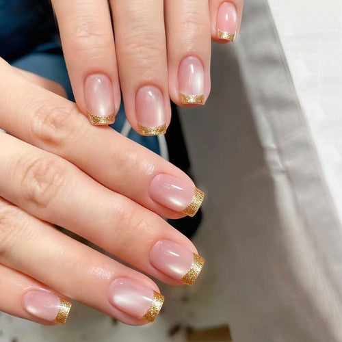 Artificial nails in elegant glitter French design Bowlift