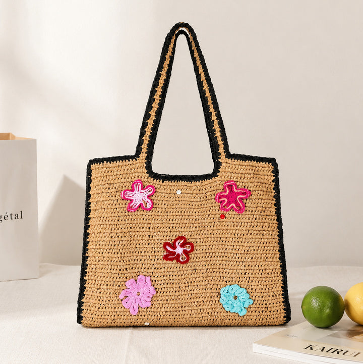Handmade straw bag with flower appliqués Bowlift