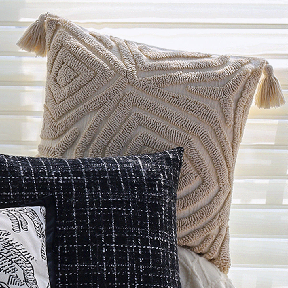 Square decorative cushion cover with hand-tufted geometric relief and corner tassels Bowlift