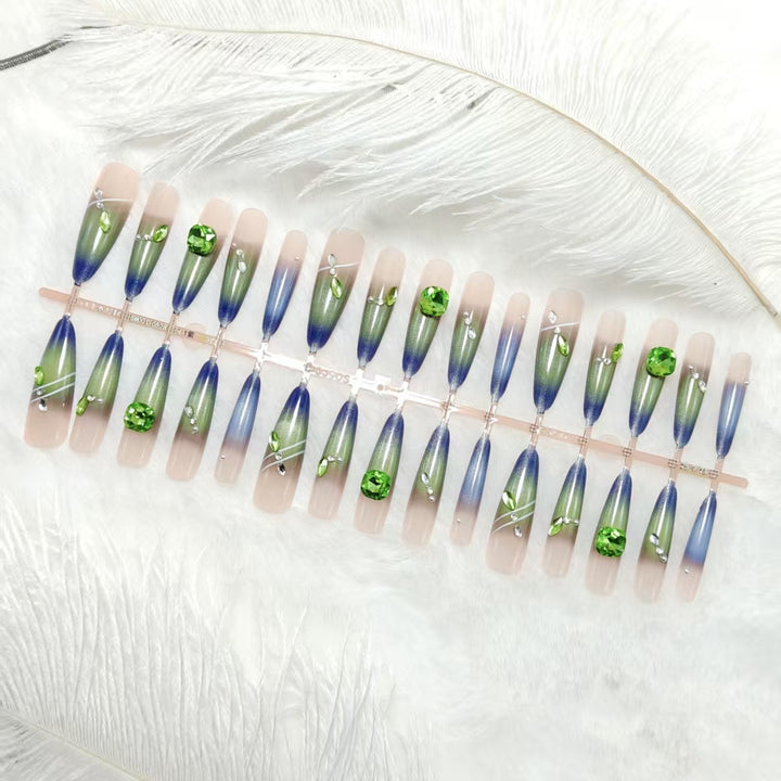 Artificial nails with elegant gradient color and glitter accents Bowlift