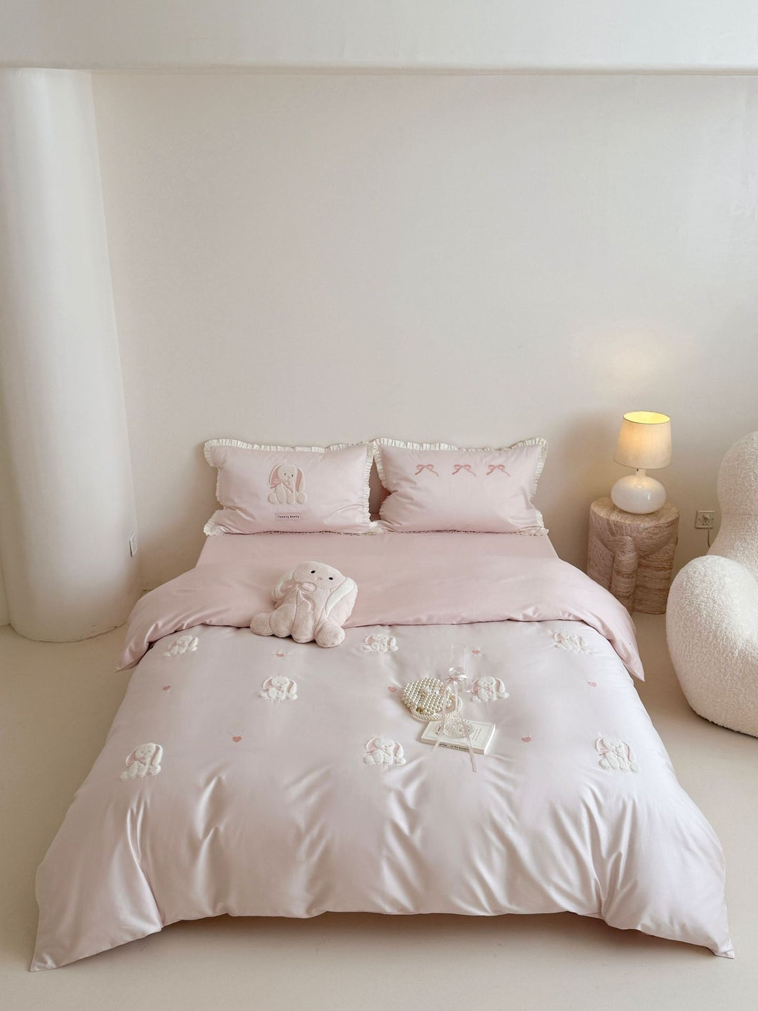 Luxurious cotton satin bedding set with embroidered bunnies and ruffled pillow Bowlift