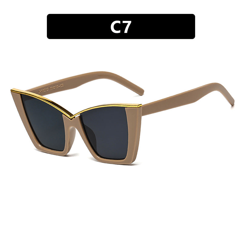 Women extravagant sunglasses with unique design and golden accents Bowlift