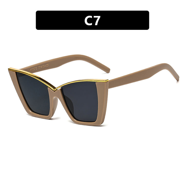 Women extravagant sunglasses with unique design and golden accents Bowlift
