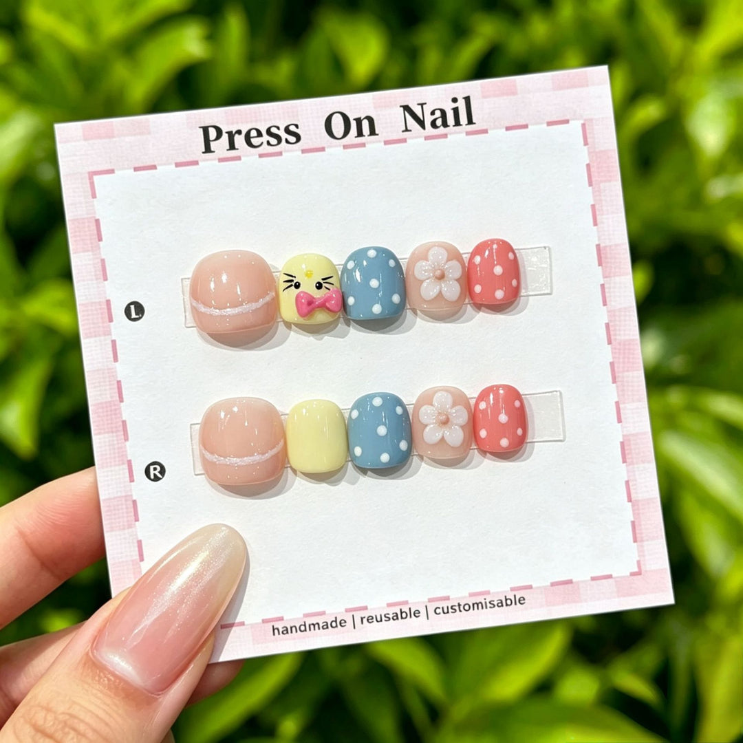 Artistic Press-On Nail Set with Floral and Graphic Designs