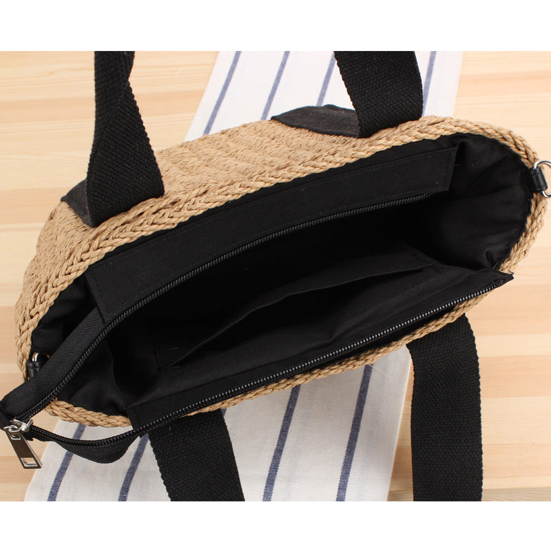 Handbag made of braided natural material with adjustable shoulder strap Bowlift
