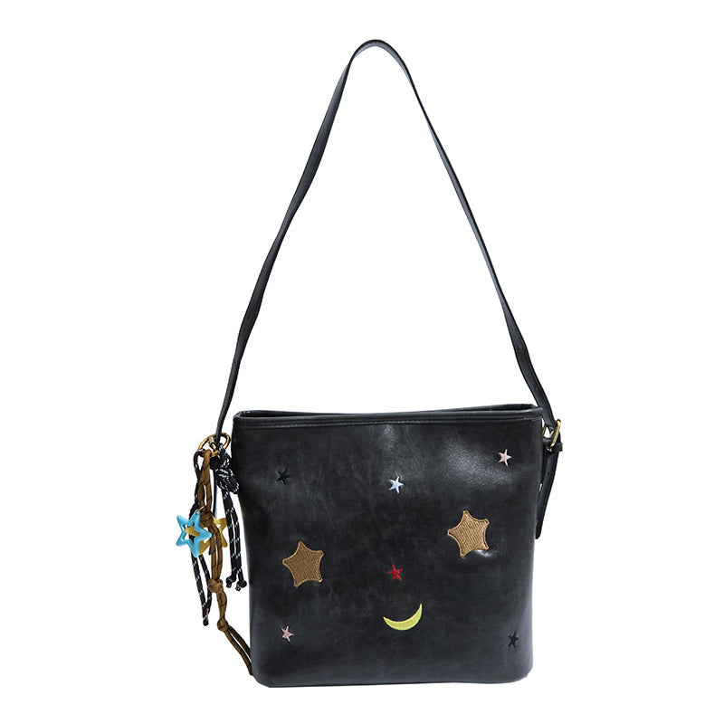 Shoulder bag with charming applications Bowlift