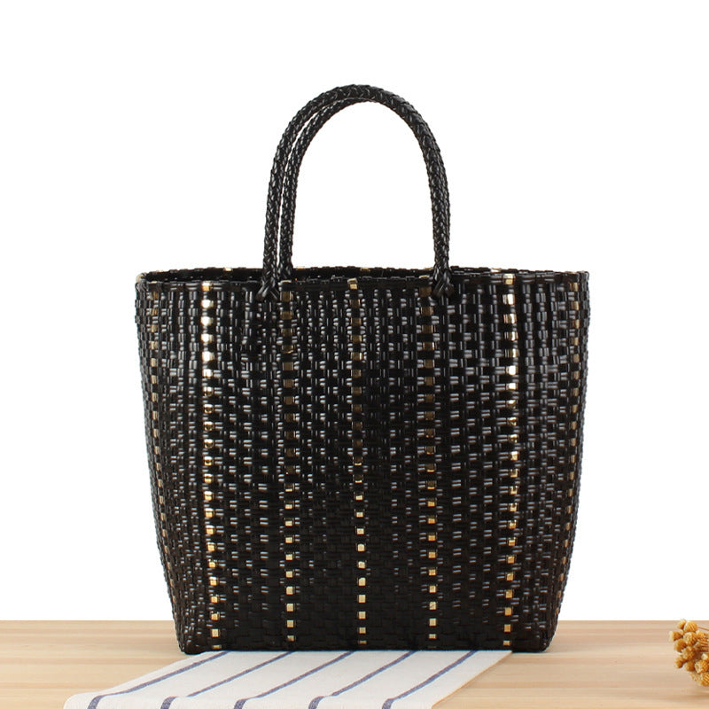 Fashionable basket bag with elegant accents Bowlift