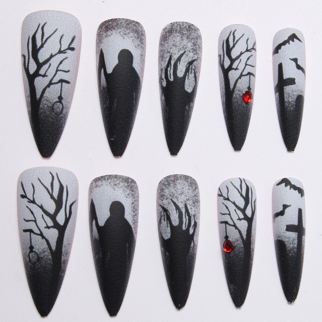 Creative press-on nails with a dark Halloween design Bowlift
