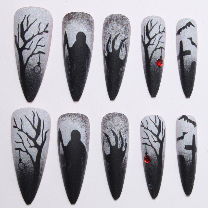 Creative press-on nails with a dark Halloween design Bowlift