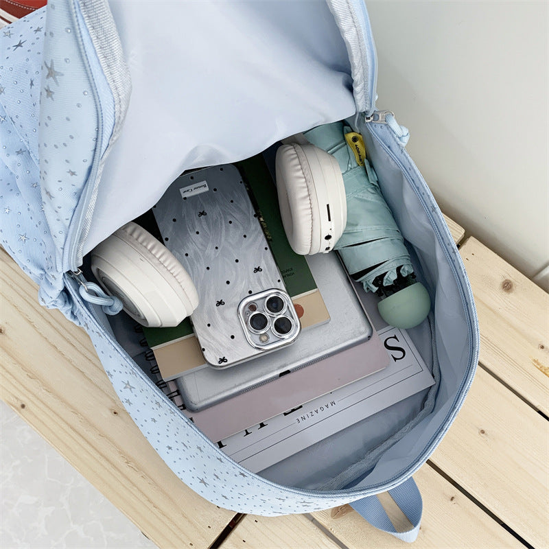 Elegant backpack with glittering stars and practical compartments Bowlift