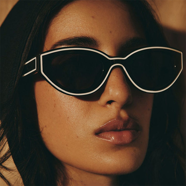 Women Cat-Eye Sunglasses with sturdy transparent frame and protective UV filter Bowlift
