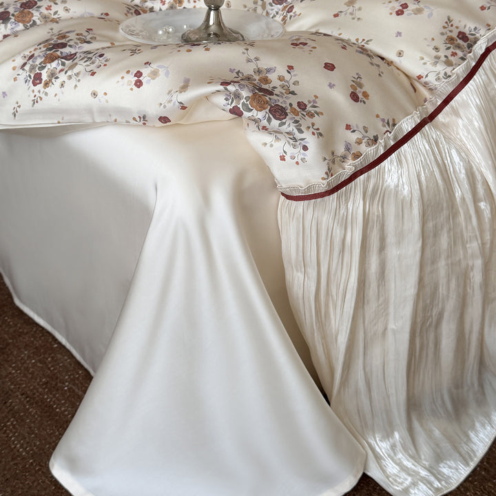 Romantic satin bedding set with ruffled edging, floral jacquard, and decorative ribbons Bowlift