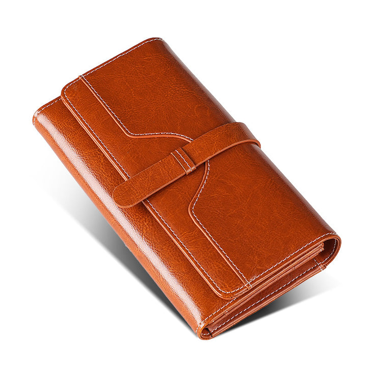 Premium leather long wallet clutch with strap closure and multiple card slots Bowlift