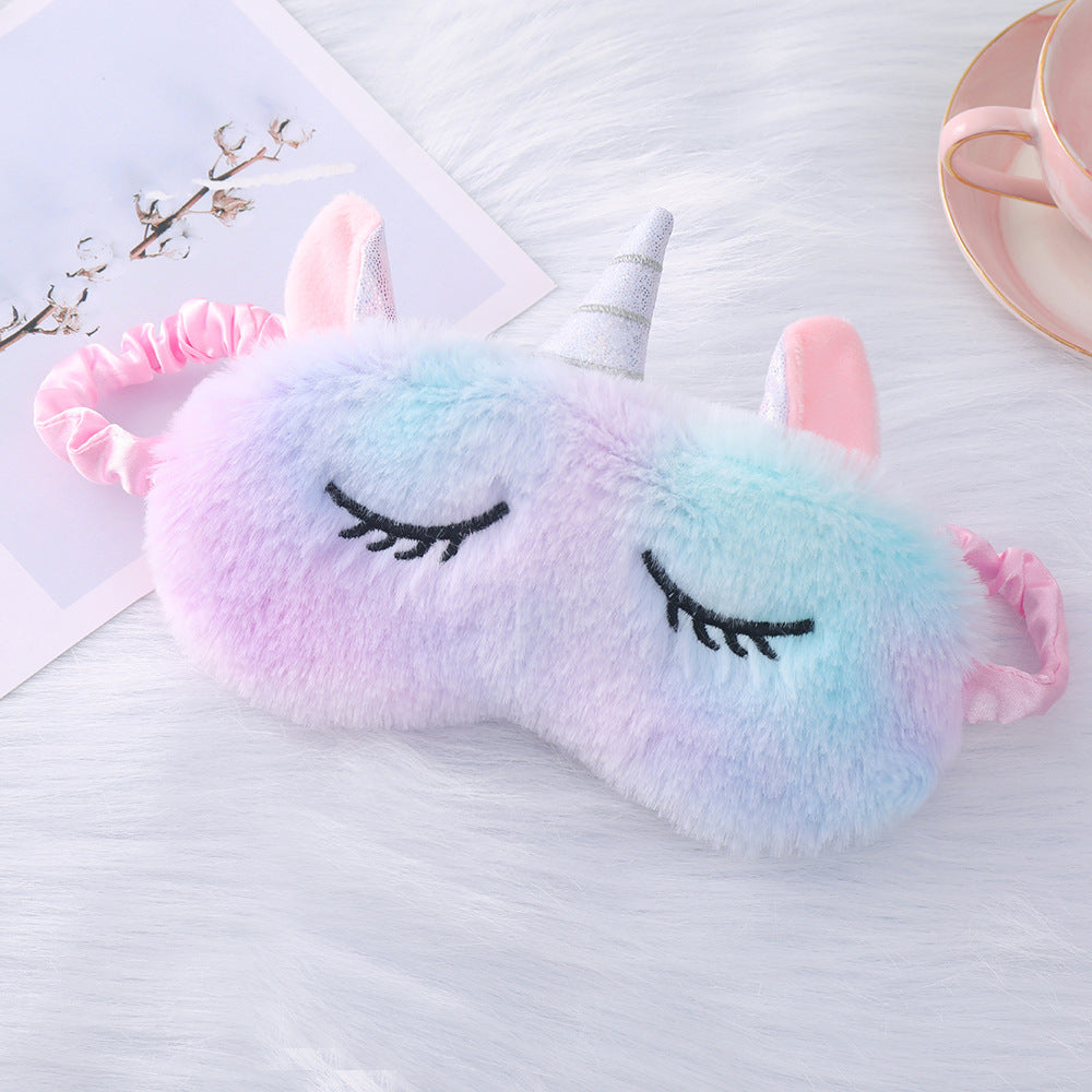 Women's plush-filled unicorn sleep mask with 3D horn, embroidered eyelashes and adjustable satin band Bowlift