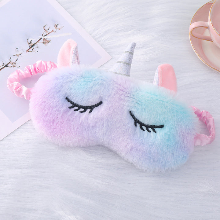 Women's plush-filled unicorn sleep mask with 3D horn, embroidered eyelashes and adjustable satin band Bowlift