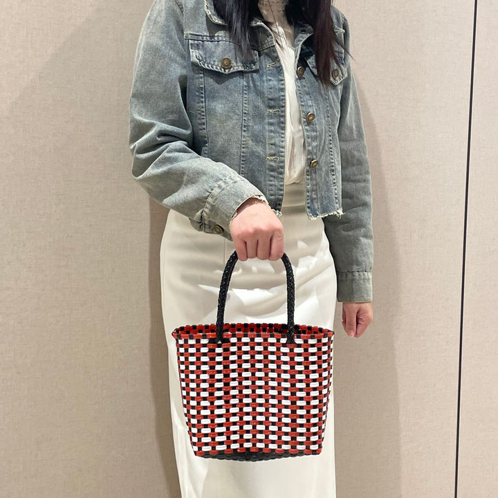 Handwoven basket bag with colorful design Bowlift