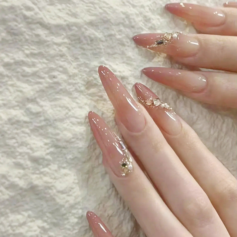 Artificial nail set with elegant ombre effect and glamorous embellishments Bowlift