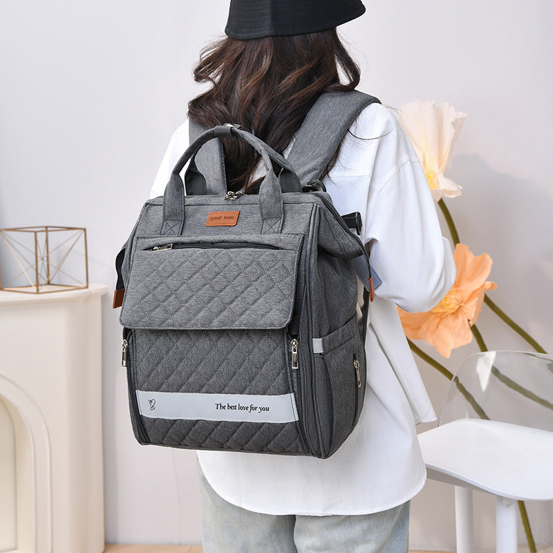 Multi-Pocket Quilted Baby Care Backpack Bowlift