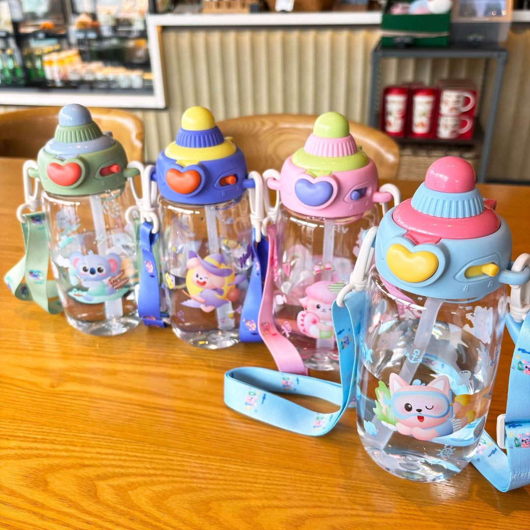 Women's transparent drinking bottle with ergonomic carrying handle and integrated straw Bowlift
